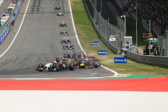 World © Octane Photographic Ltd. Sunday 22nd June 2014. Red Bull Ring, Spielberg - Austria - Formula 1 Race. Sahara Force India VJM07 – Nico Hulkenburg and Infiniti Red Bull Racing RB10 – Daniel Ricciardo. Digital Ref : 1000LB1D5115