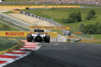 World © Octane Photographic Ltd. Sunday 22nd June 2014. Red Bull Ring, Spielberg - Austria - Formula 1 Race. Williams Martini Racing FW36 – Felipe Massa leads early in the race. Digital Ref: 1000LB1D5460