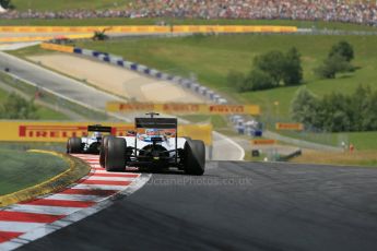 World © Octane Photographic Ltd. Sunday 22nd June 2014. Red Bull Ring, Spielberg - Austria - Formula 1 Race. Williams Martini Racing FW36 – Felipe Massa and Valtteri Bottas running 1-2 early in the race. Digital Ref: 1000LB1D5465