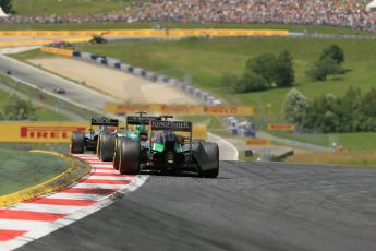 World © Octane Photographic Ltd. Sunday 22nd June 2014. Red Bull Ring, Spielberg - Austria - Formula 1 Race. McLaren Mercedes MP4/29 – Kevin Magnussen, Caterham F1 Team CT05 – Marcus Ericsson and Sahara Force India VJM07 – Nico Hulkenburg. Digital Ref: 1000LB1D5532