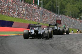 World © Octane Photographic Ltd. Sunday 22nd June 2014. Red Bull Ring, Spielberg - Austria - Formula 1 Race. McLaren Mercedes MP4/29 - Jenson Button and Mercedes AMG Petronas F1 W05 Hybrid - Nico Rosberg. Digital Ref: 1000LB1D5593