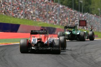 World © Octane Photographic Ltd. Sunday 22nd June 2014. Red Bull Ring, Spielberg - Austria - Formula 1 Race. Caterham F1 Team CT05 – Kamui Kobayashi and Marussia F1 Team MR03 - Jules Bianchi. Digital Ref: 1000LB1D5610