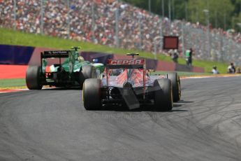 World © Octane Photographic Ltd. Sunday 22nd June 2014. Red Bull Ring, Spielberg - Austria - Formula 1 Race. Caterham F1 Team CT05 – Marcus Ericsson and Scuderia Toro Rosso STR 9 – Daniil Kvyat. Digital Ref: 1000LB1D5621