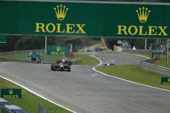 World © Octane Photographic Ltd. Friday 20th June 2014. Red Bull Ring, Spielberg - Austria - Formula 1 Practice 1. Lotus F1 Team E22 - Romain Grosjean. Digital Ref: 0991LB1D0373