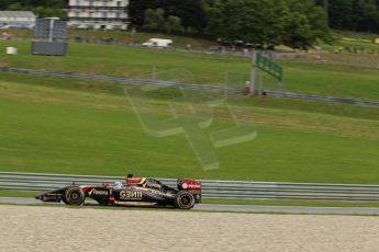 World © Octane Photographic Ltd. Friday 20th June 2014. Red Bull Ring, Spielberg - Austria - Formula 1 Practice 1. Lotus F1 Team E22 - Romain Grosjean. Digital Ref: 0991LB1D0863
