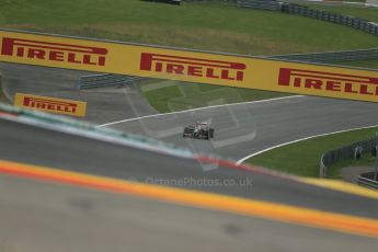 World © Octane Photographic Ltd. Friday 20th June 2014. Red Bull Ring, Spielberg - Austria - Formula 1 Practice 1. Lotus F1 Team E22 - Romain Grosjean. Digital Ref: 0991LB1D9583