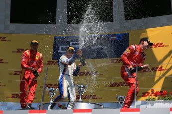 World © Octane Photographic Ltd. Sunday 22nd June 2014. GP2 Race 2 Podium – Red Bull Ring, Spielberg - Austria. Johnny Cecotto - Trident with Stefano Coletti and Raffaele Marciello - Racing Engineering. Digital Ref : 0999LB1D4433