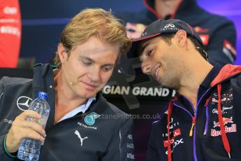 World © Octane Photographic Ltd. Thursday 21st August 2014. Belgian GP, Spa-Francorchamps - Formula 1 FIA Press Conference. Infiniti Red Bull Racing - Daniel Ricciardo talking with Mercedes AMG Petronas - Nico Rosberg. Digital Ref: 1078LB1D6454