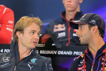 World © Octane Photographic Ltd. Thursday 21st August 2014. Belgian GP, Spa-Francorchamps - Formula 1 FIA Press Conference. Infiniti Red Bull Racing - Daniel Ricciardo talking with Mercedes AMG Petronas - Nico Rosberg. Digital Ref: 1078LB1D6469