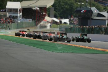 World © Octane Photographic Ltd. Sunday 24th August 2014, Belgian GP, Spa-Francorchamps. - Formula 1 Race. All the F1 grid successful around the 1st corner. Digital Ref: 1090LB1D1721