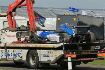 World © Octane Photographic Ltd. Cooper Tyres British Formula 3 (F3). Rockingham - Qualifying, Sunday 4th May 2014. Dallara F308 Mercedes HWA – Camren Kaminsky's Double R Racing car is returned to the pits. Digital Ref : 0920lb1d1909