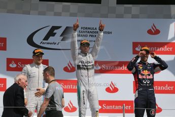 World © Octane Photographic Ltd. Saturday 5th July 2014. British GP, Silverstone, UK. - Formula 1 Podium. Mercedes AMG Petronas F1 W05 Hybrid – Lewis Hamilton (1st), Williams Martini Racing FW36 – Valtteri Bottas (2nd) and Infiniti Red Bull Racing RB10 – Daniel Ricciardo (3rd). Digital Ref: 1027LB1D1759