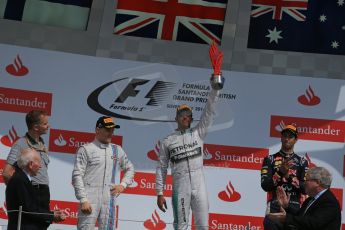 World © Octane Photographic Ltd. Saturday 5th July 2014. British GP, Silverstone, UK. - Formula 1 Podium. Mercedes AMG Petronas F1 W05 Hybrid – Lewis Hamilton (1st), Williams Martini Racing FW36 – Valtteri Bottas (2nd), Infiniti Red Bull Racing RB10 – Daniel Ricciardo (3rd). Digital Ref: 1027LB1D1811