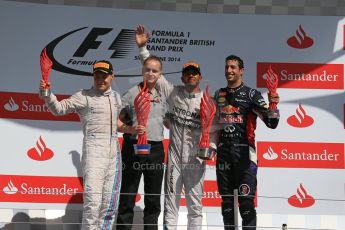 World © Octane Photographic Ltd. Saturday 5th July 2014. British GP, Silverstone, UK. - Formula 1 Podium. Mercedes AMG Petronas F1 W05 Hybrid – Lewis Hamilton (1st), Williams Martini Racing FW36 – Valtteri Bottas (2nd), Infiniti Red Bull Racing RB10 – Daniel Ricciardo (3rd). Digital Ref: 1027LB1D1943