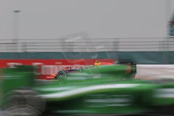 World © Octane Photographic Ltd. Saturday 5th July 2014. British GP, Silverstone, UK. Formula 1 Qualifying. Infiniti Red Bull Racing RB10 - Sebastian Vettel and Caterham F1 Team CT05 – Kamui Kobayashi. Digital Ref: 1020LB1D0005