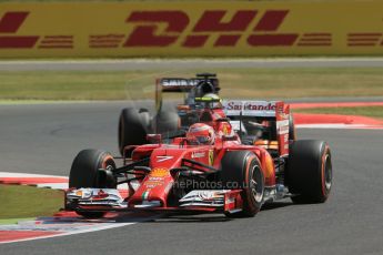 World © Octane Photographic Ltd. Friday 4th July 2014. British GP - Silverstone, UK. - Formula 1 Practice 1. Scuderia Ferrari F14T – Kimi Raikkonen and Sahara Force India VJM07 – Daniel Juncadella. Digital Ref: 1011LB1D7286