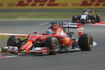World © Octane Photographic Ltd. Friday 4th July 2014. British GP - Silverstone, UK. - Formula 1 Practice 1. Scuderia Ferrari F14T - Fernando Alonso and Sahara Force India VJM07 – Sergio Perez. Digital Ref: 1011LB1D7547