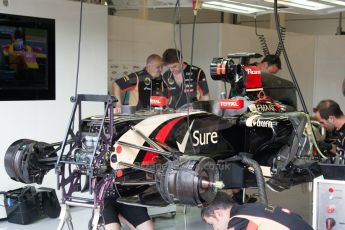 World © Octane Photographic Ltd. Friday 4th July 2014. British GP - Silverstone, UK. - Formula 1 Practice 2. Lotus F1 Team E22 front suspension and brakes - Romain Grosjean. Digital Ref: 1013JM1D1100