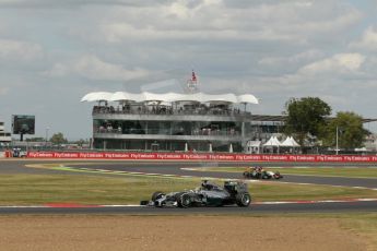 World © Octane Photographic Ltd. Friday 4th July 2014. British GP - Silverstone, UK. - Formula 1 Practice 2. Mercedes AMG Petronas F1 W05 Hybrid – Lewis Hamilton and Sahara Force India VJM07 – Nico Hulkenburg. Digital Ref: 1013LB1D2600