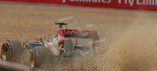 World © Octane Photographic Ltd. Friday 4th July 2014. British GP - Silverstone, UK. - Formula 1 Practice 2. Lotus F1 Team E22 - Romain Grosjean in the gravel. Digital Ref: 1013LB1D8393
