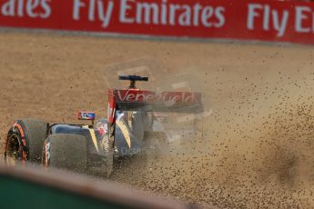 World © Octane Photographic Ltd. Friday 4th July 2014. British GP - Silverstone, UK. - Formula 1 Practice 2. Lotus F1 Team E22 - Romain Grosjean in the gravel. Digital Ref: 1013LB1D8395