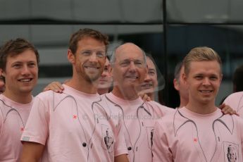 World © Octane Photographic Ltd. Saturday 5th July 2014. British GP, Silverstone, UK. - Formula 1 Paddock. Jenson Button, Kevin Magnussen, Ron Dennis and the McLaren team in their #Pinkforpapa shirts. Digital Ref: 1025LB1D0612