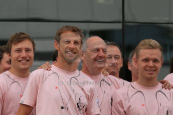 World © Octane Photographic Ltd. Saturday 5th July 2014. British GP, Silverstone, UK. - Formula 1 Paddock. Jenson Button, Kevin Magnussen, Ron Dennis and the McLaren team in their #Pinkforpapa shirts. Digital Ref: 1025LB1D0634