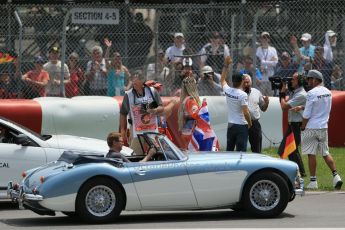 World © Octane Photographic Ltd. Sunday 8th June 2014. Canada - Circuit Gilles Villeneuve, Montreal. Formula 1 Driver Parade. Mercedes AMG Petronas F1 W05 Hybrid - Nico Rosberg and team mate Lewis Hamilton stop to talk to TV Camera. Digital Ref: 0988LB1D7879