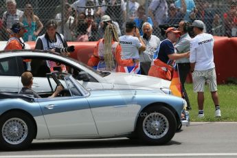 World © Octane Photographic Ltd. Sunday 8th June 2014. Canada - Circuit Gilles Villeneuve, Montreal. Formula 1 Driver Parade. Mercedes AMG Petronas F1 W05 Hybrid - Nico Rosberg and team mate Lewis Hamilton stop to talk to TV Camera. Digital Ref: 0988LB1D7881