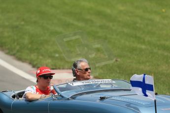World © Octane Photographic Ltd. Sunday 8th June 2014. Canada - Circuit Gilles Villeneuve, Montreal. Formula 1 Driver Parade. Scuderia Ferrari F14T – Kimi Raikkonen. Digital Ref: 0988LB1D7969