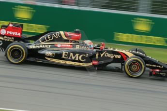 World © Octane Photographic Ltd. Friday 6th June 2014. Canada - Circuit Gilles Villeneuve, Montreal. Formula 1 Practice 1. Lotus F1 Team E22 - Romain Grosjean with front discs glowing. Digital Ref: 0978LB1D2803