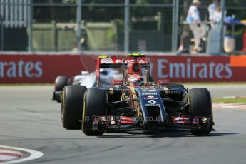 World © Octane Photographic Ltd. Friday 6th June 2014. Canada - Circuit Gilles Villeneuve, Montreal. Formula 1 Practice 2. Lotus F1 Team E22 – Pastor Maldonado and Williams Martini Racing FW36 – Valtteri Bottas. Digital Ref: 0979LB1D5023