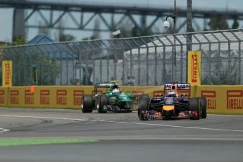 World © Octane Photographic Ltd. Saturday 7th June 2014. Canada - Circuit Gilles Villeneuve, Montreal. Formula 1 Qualifying. Infiniti Red Bull Racing RB10 - Sebastian Vettel and Caterham F1 Team CT05 – Marcus Ericsson. Digital Ref: 0983LB1D5904
