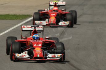 World © Octane Photographic Ltd. Sunday 8th June 2014. Canada - Circuit Gilles Villeneuve, Montreal. Formula 1 Race. Scuderia Ferrari F14T - Fernando Alonso followed by team mate Kimi Raikkonen. Digital Ref: 0986LB1D0371