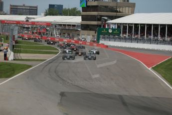World © Octane Photographic Ltd. Sunday 8th June 2014. Canada - Circuit Gilles Villeneuve, Montreal. Formula 1 Race. Mercedes AMG Petronas F1 W05 Hybrid - Nico Rosberg leads race start. Digital Ref: 0986LB1D8130