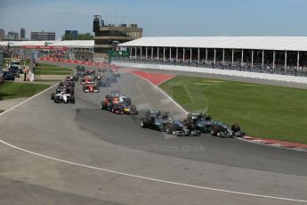 World © Octane Photographic Ltd. Sunday 8th June 2014. Canada - Circuit Gilles Villeneuve, Montreal. Formula 1 Race. Mercedes AMG Petronas F1 W05 Hybrid - Nico Rosberg leads race start. Digital Ref: 0986LB1D8149