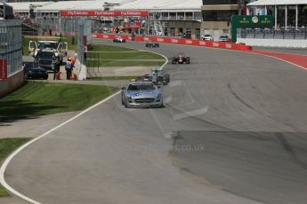 World © Octane Photographic Ltd. Sunday 8th June 2014. Canada - Circuit Gilles Villeneuve, Montreal. Formula 1 Race. Mercedes AMG Petronas F1 W05 Hybrid - Nico Rosberg leads under safety car. Digital Ref: 0986LB1D8312