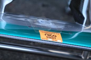 World © Octane Photographic Ltd. Friday 18th July 2014. Post F1 practice 1 pitlane – German GP - Hockenheim. Mercedes AMG Petronas F1 W05 Hybrid front wing sticker. Digital Ref : 1039CB7D4834