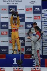 World © Octane Photographic Ltd. FIA European F3 Championship, Silverstone, UK, April 19th 2014 - Race 1. 1st - Jagonya Ayam with Carlin, Tom Blomqvist hoists his trophy on the podium. Digital  Digital Ref : 0909lb1d7025