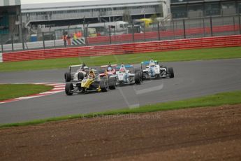 World © Octane Photographic Ltd. BRDC Formula 4 Championship. MSV F4-013. Silverstone, Sunday 27th April 2014. Sean Walkinshaw Racing (SWR) – Nicolas Beer heads off heavy competition. Digital Ref : 0914lb1d1934