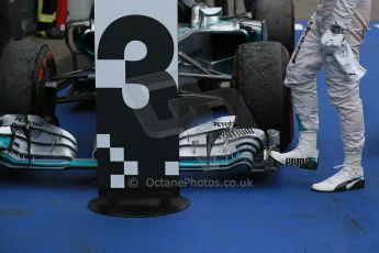 World © Octane Photographic Ltd. Sunday 20th July 2014. German GP, Hockenheim. - Formula 1 Parc Ferme. Mercedes AMG Petronas F1 W05 Hybrid – Lewis Hamilton inspects his damaged front wing. Digital Ref: 1052LB1D8732