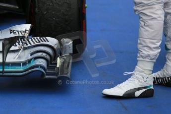 World © Octane Photographic Ltd. Sunday 20th July 2014. German GP, Hockenheim. - Formula 1 Parc Ferme. Mercedes AMG Petronas F1 W05 Hybrid – Lewis Hamilton inspects his damaged front wing. Digital Ref: 1052LB1D8736