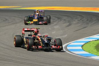 World © Octane Photographic Ltd. Friday 18th July 2014. German GP, Hockenheim. - Formula 1 Practice 2. Lotus F1 Team E22 – Pastor Maldonado and Infiniti Red Bull Racing RB10 – Daniel Ricciardo. Digital Ref: 1037LB1D5686