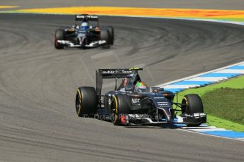 World © Octane Photographic Ltd. Friday 18th July 2014. German GP, Hockenheim. - Formula 1 Practice 2. Sauber C33 – Esteban Gutierrez and Adrian Sutil. Digital Ref : 1037LB1D5698