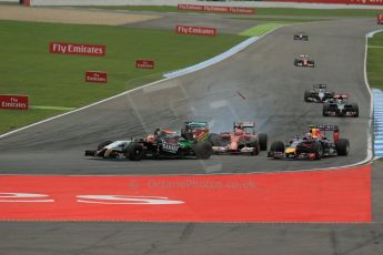 World © Octane Photographic Ltd. Sunday 20th July 2014. German GP, Hockenheim. - Formula 1 Race. Sahara Force India VJM07 – Nico Hulkenburg, Mercedes AMG Petronas F1 W05 Hybrid – Lewis Hamilton and Scuderia Ferrari F14T – Kimi Raikkonen all come together. Digital Ref :