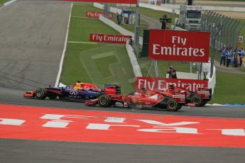 World © Octane Photographic Ltd. Sunday 20th July 2014. German GP, Hockenheim. Formula 1 Race. Infiniti Red Bull Racing RB10 - Sebastian Vettel andScuderia Ferrari F14T - Fernando Alonso and Kimi Raikkonen who has just lost a front wing endplate. Digital Ref: