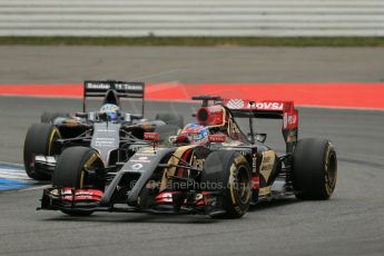 World © Octane Photographic Ltd. Sunday 20th July 2014. German GP, Hockenheim. - Formula 1 Race. Lotus F1 Team E22 - Romain Grosjean and Sauber C33 – Adrian Sutil. Digital Ref: