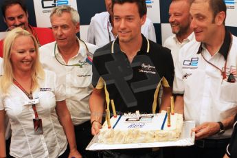 World © Octane Photographic Ltd. Saturday 19th July 2014. GP2's 200th race celebration cake held by championship leader Jolyon Palmer of DAMS. Digital ref: 1045CB7D6007