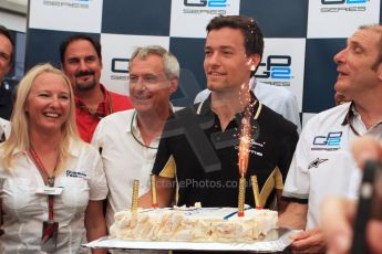 World © Octane Photographic Ltd. Saturday 19th July 2014. GP2's 200th race celebration cake held by championship leader Jolyon Palmer of DAMS. Digital ref: 1045CB7D6071
