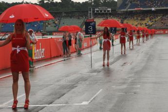 World © Octane Photographic Ltd. Sunday 20th July 2014. GP2 Race 2 – German GP - Hockenheim. The grid girls with umbrellas on the start grid. Digital Ref : 1050CB7D6561